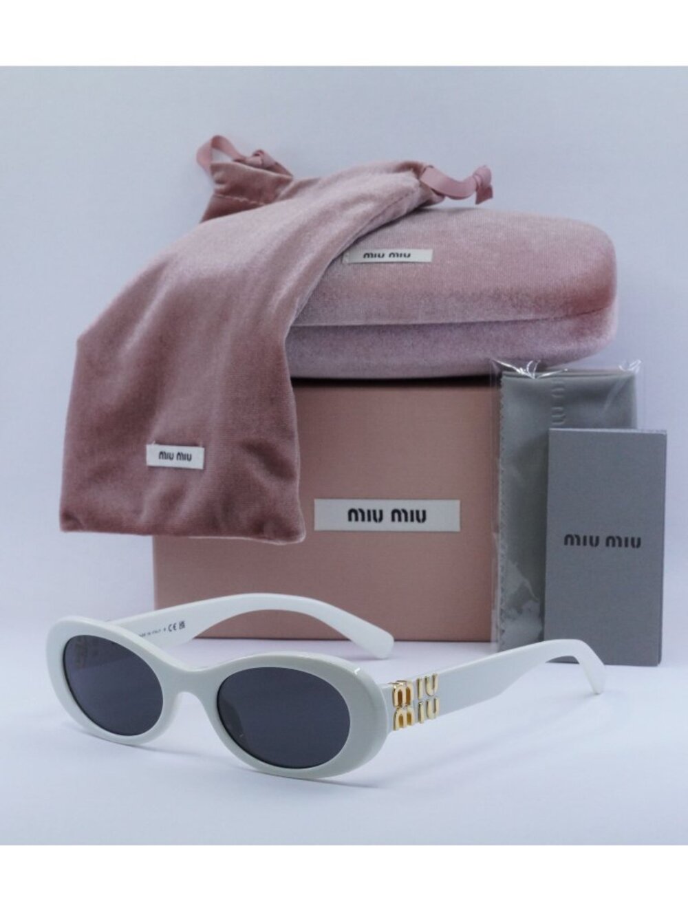 Exclusive Sale! Miu Miu MU06ZS 1425S0 Oval Sunglasses - White / Grey
